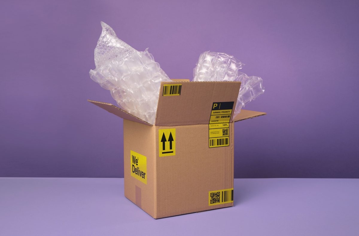 Corrugated shipping box with packaging